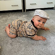 Luca joined the competition — help win amazing prizes! baby, child, crawling, plaid_clothing, cap, carpet, indoor, furniture, drawer, blue_eyes, cute, infant, person, floor, headwear, skin, hand, foot, expression, portrait