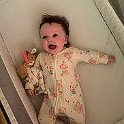 Astrid joined the competition — help win amazing prizes! baby, bed, clothing, cradle, crib, face, furniture, happy, head, infantbed, pajamas, person, photography, portrait