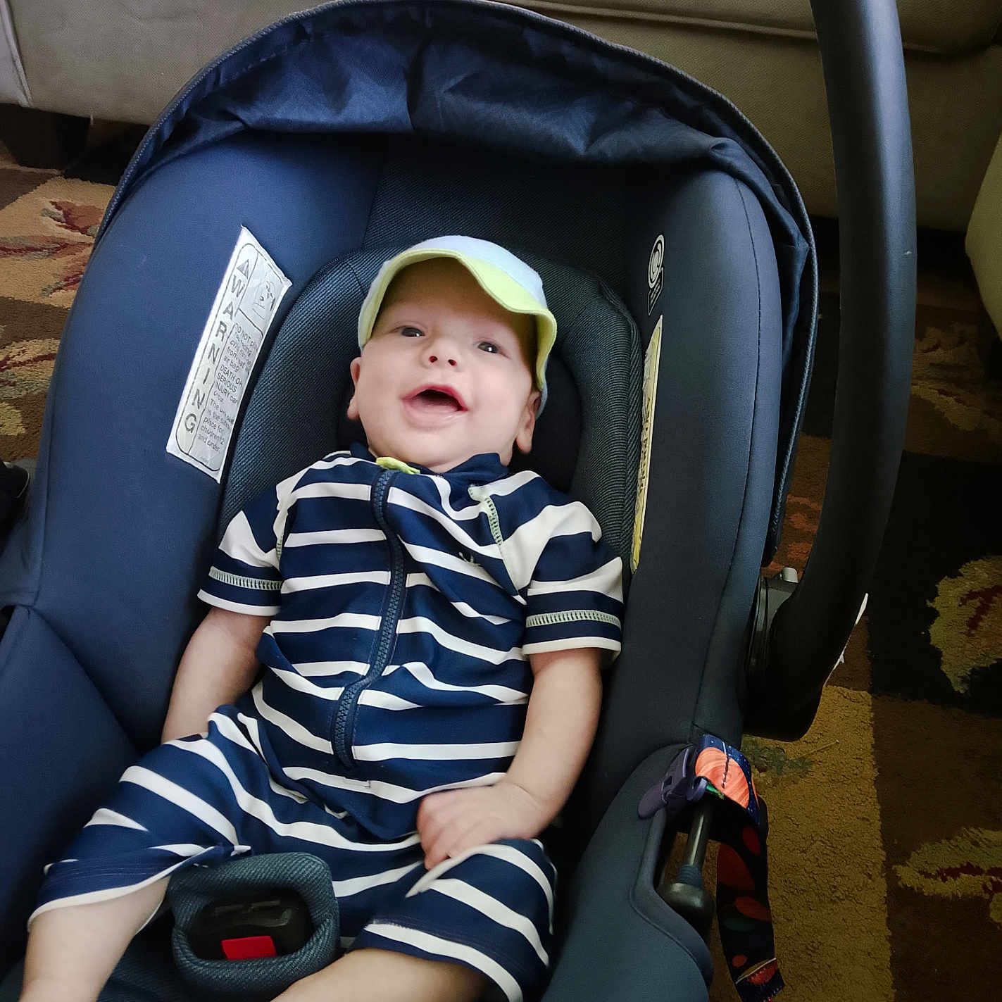 Matthew is registered to the contest to win money with this photo: baby, cap, car, car_interior, carseat, clothing, couch, crib, face, furniture, hat, head, homedecor, infantbed, person, photography, portrait, stroller, transportation, vehicle