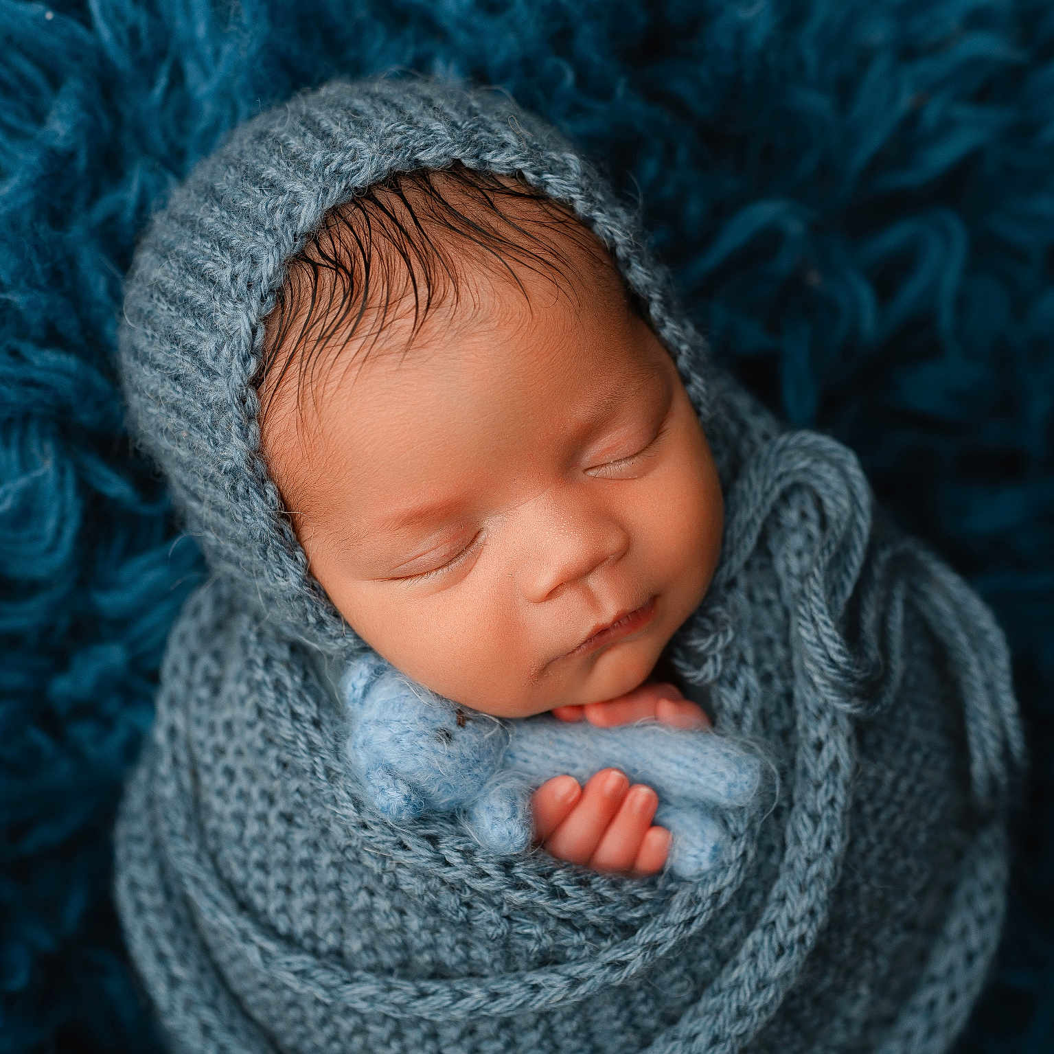 Oliver is registered to the contest to win money with this photo: baby, blanket, blue, child, closeup, cozy, cute, face, hand, head, infant, knitted_wrap, newborn, peaceful, portrait, rest, sleeping, soft_texture, teddy_bear, warm