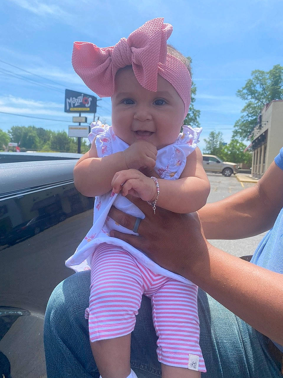 Addilyn joined the competition — help win amazing prizes! baseball_cap, cap, electric_blue, finger, fun, gesture, happy, hat, headwear, leisure, magenta, person, pink, recreation, shorts, sky, smile, summer, sun_hat, thigh