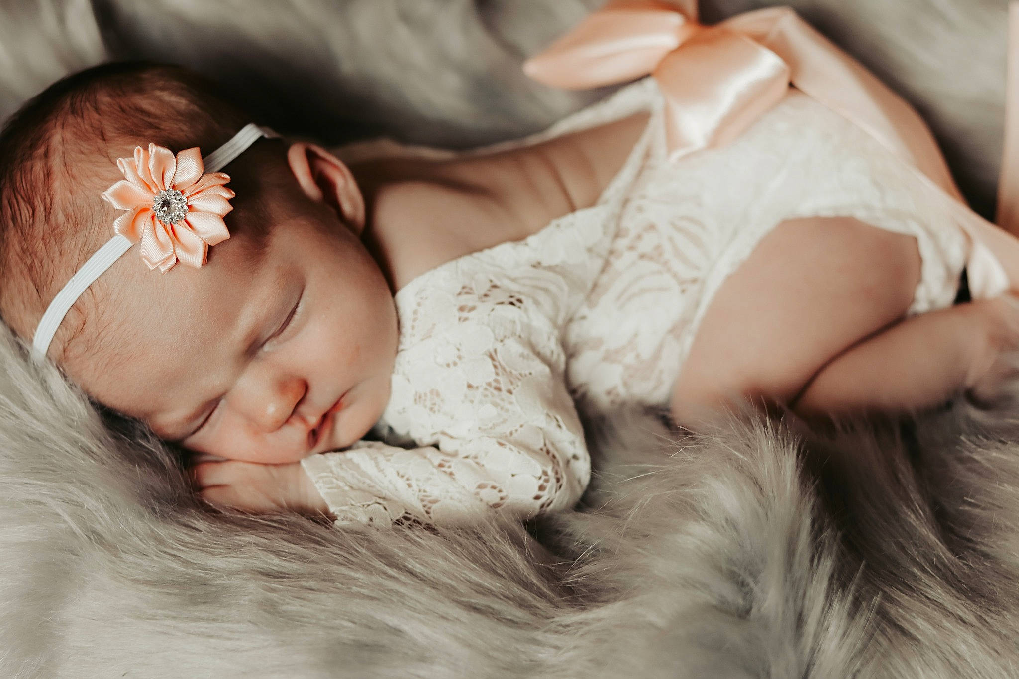 Harlee is registered to the contest to win money with this photo: arm, baby, baby_sleeping, baby_toddler_clothing, clothing, comfort, dress, eye, finger, flash_photography, flower, grass, hand, happy, headband, headgear, jewellery, person, skin, toddler