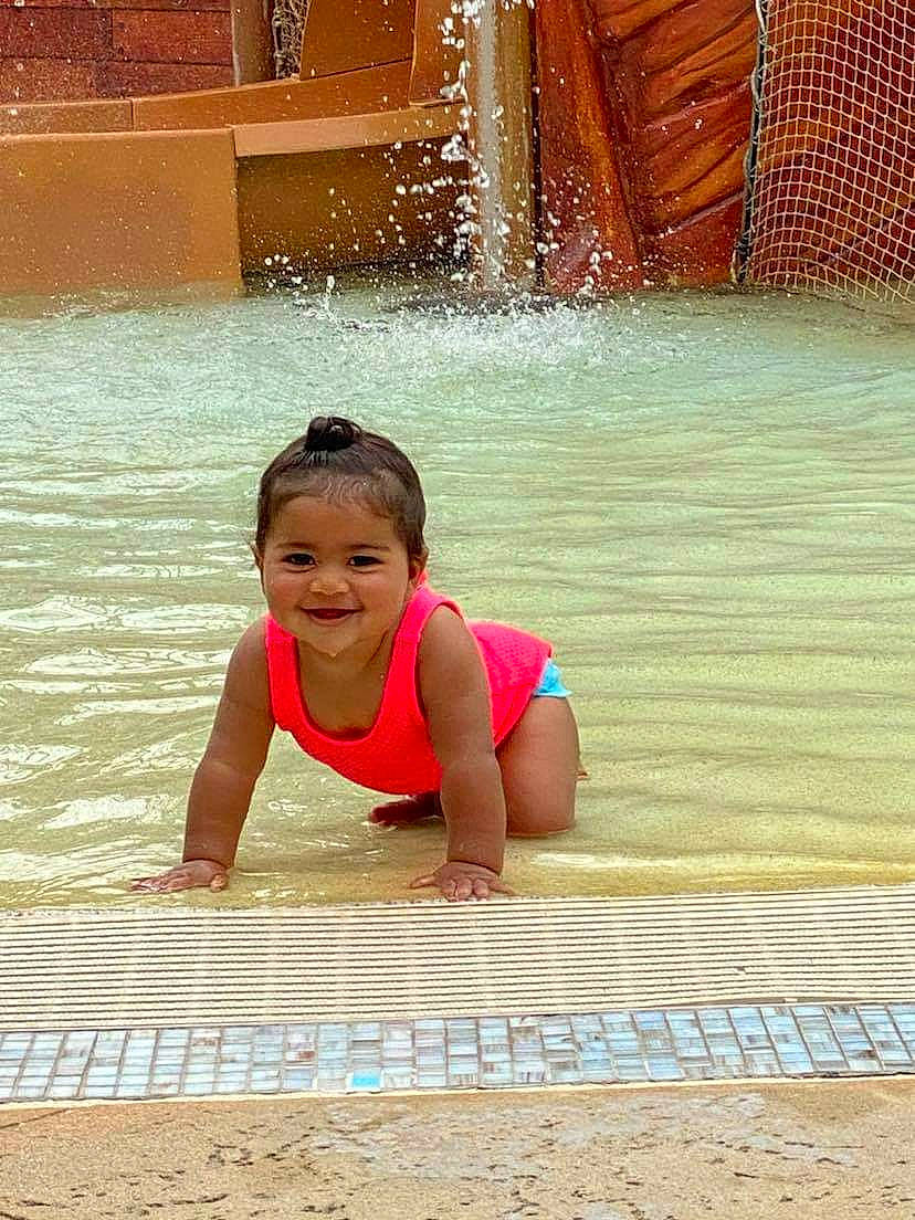 Olive joined the competition — help win amazing prizes! barefoot, bathing, chest, child, chin, floor, flooring, fun, happy, human_leg, joy, leisure, person, play, recreation, skin, swimming_pool, temple, thigh, toddler