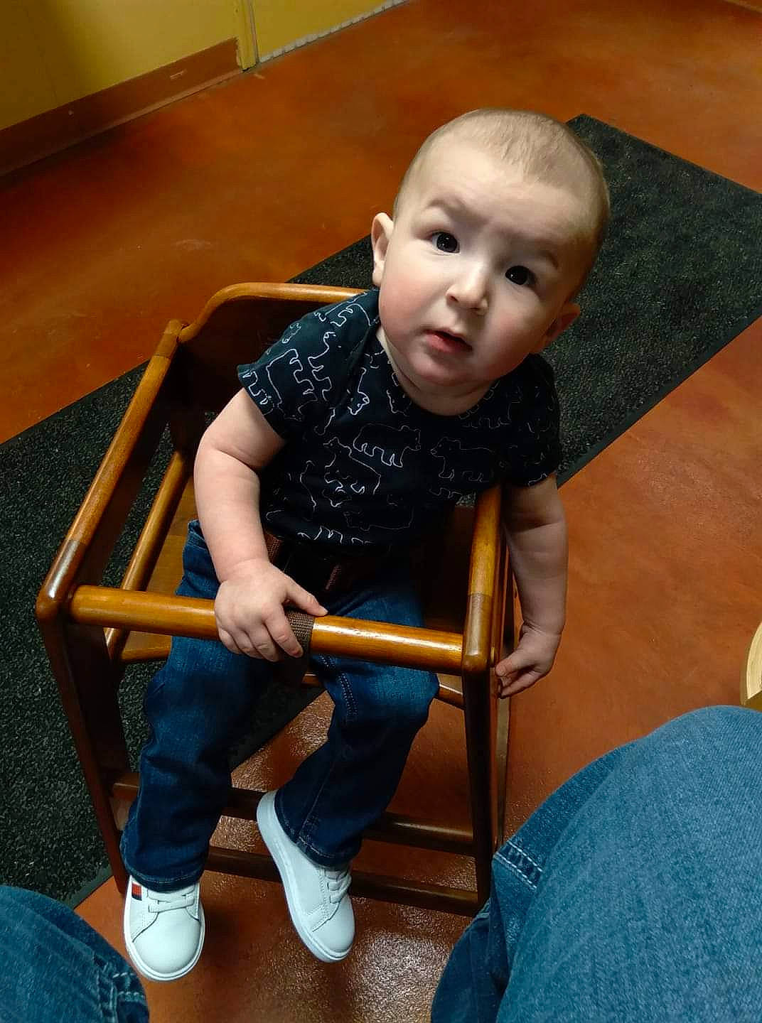 Hunter joined the competition — help win amazing prizes! chair, child, comfort, elbow, finger, floor, flooring, fun, hardwood, human_leg, jeans, joint, knee, leg, person, sitting, skin, surprise, t_shirt, thigh