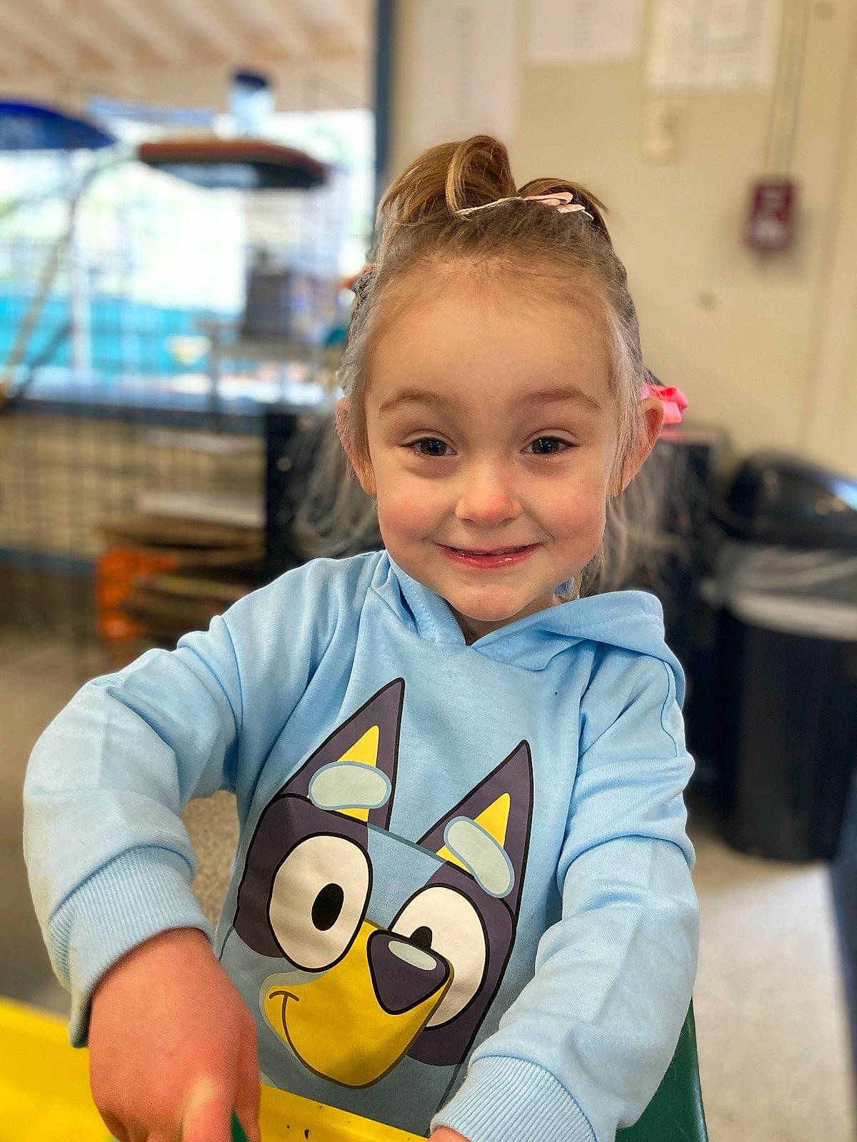 Scarlett is registered to the contest to win money with this photo: angry_birds, baby, baby_toddler_clothing, child, event, fun, hairstyle, happy, joy, leisure, person, play, recreation, room, sitting, smile, snapshot, stuffed_toy, sunglasses, t_shirt