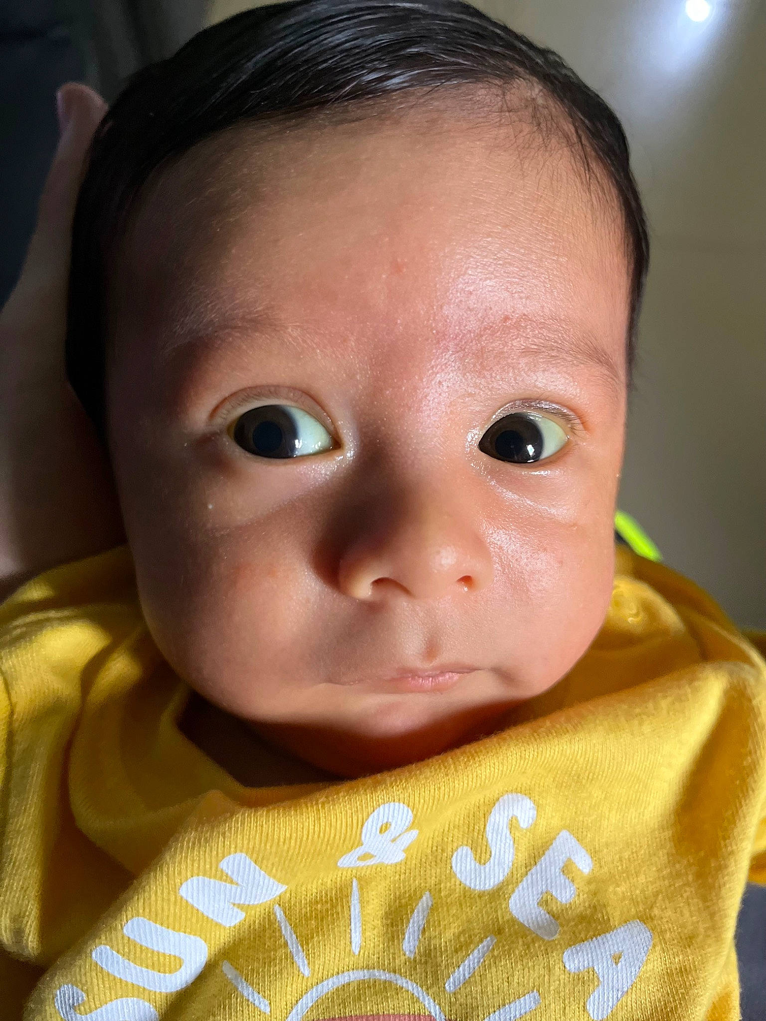 Yeshua is registered to the contest to win money with this photo: baby, baby_toddler_clothing, cheek, child, chin, close_up, ear, eyelash, fun, happy, lip, mouth, neck, nose, person, skin, sleeve, toddler