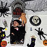 Celine joined the competition — help win amazing prizes! baby, sleeping, halloween, decorations, spiders, pumpkin, skull, fake_hand, tombstone, black_clothing, box, holiday, costume, table, toy, cute, holiday_theme, festive, child, indoor
