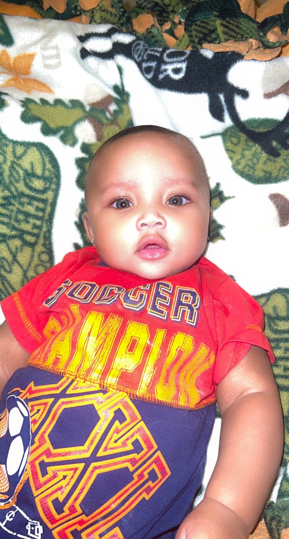 Dekaidence joined the competition — help win amazing prizes! baby, baby_products, baby_toddler_clothing, cheek, child, child_model, chin, cool, flash_photography, fun, happy, jersey, logo, person, personal_protective_equipment, portrait_photography, skin, sleeve, t_shirt, toddler