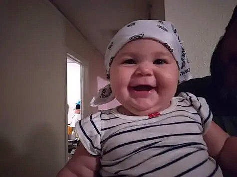 Estrella joined the competition — help win amazing prizes! baby, baby_laughing, baby_toddler_clothing, cap, cheek, child, chin, eyebrow, gesture, happy, headwear, iris, joy, lip, mouth, nose, person, skin, smile, t_shirt