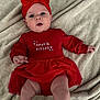 baby, infant, headband, bow, red_dress, onesie, blanket, lying_down, face, eyes, mouth, hand, legs, chubby_legs, cute, portrait, hugs_and_kisses, adorable, soft_texture, hearts