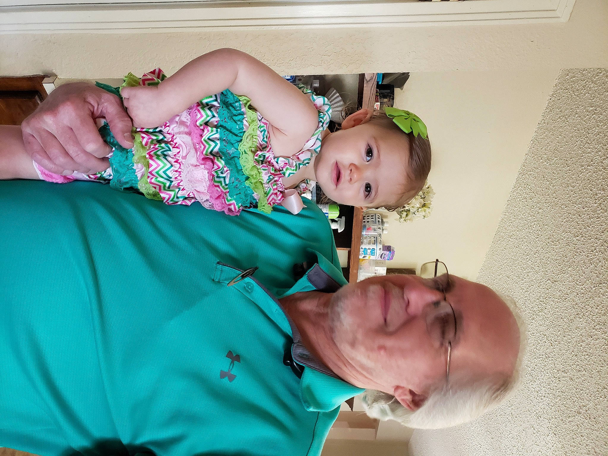 Cambrie is registered to the contest to win money with this photo: abdomen, arm, baby, baby_toddler_clothing, child, comfort, event, finger, fun, glasses, happy, jewellery, joy, muscle, person, room, shoulder, sitting, smile, textile