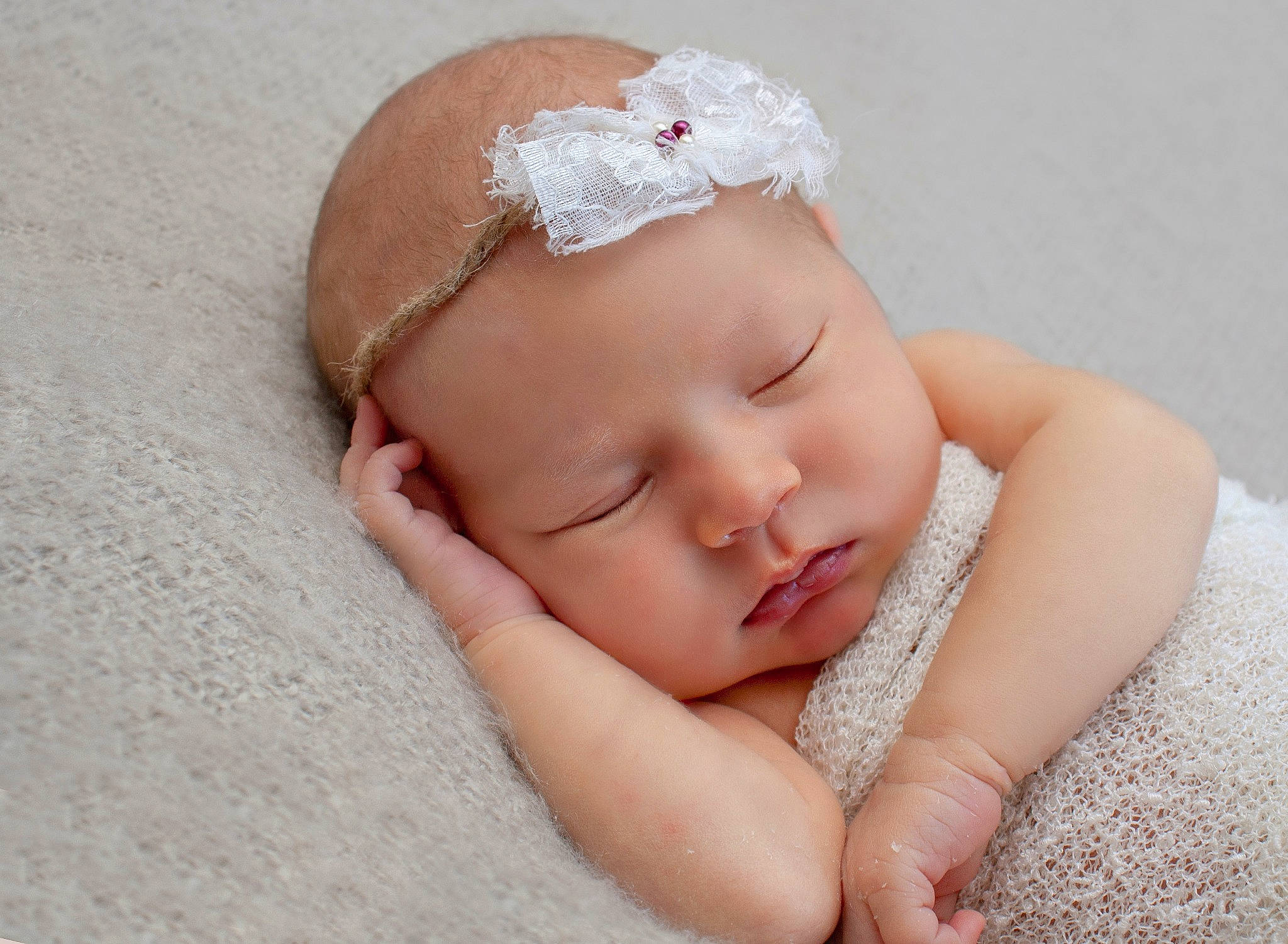 Cecilia is registered to the contest to win money with this photo: baby, baby_sleeping, child, face, fashion_accessory, forehead, hair_accessory, hand, head, headband, headgear, headpiece, lip, nose, person, photograph, photography, pink, portrait_photography, skin