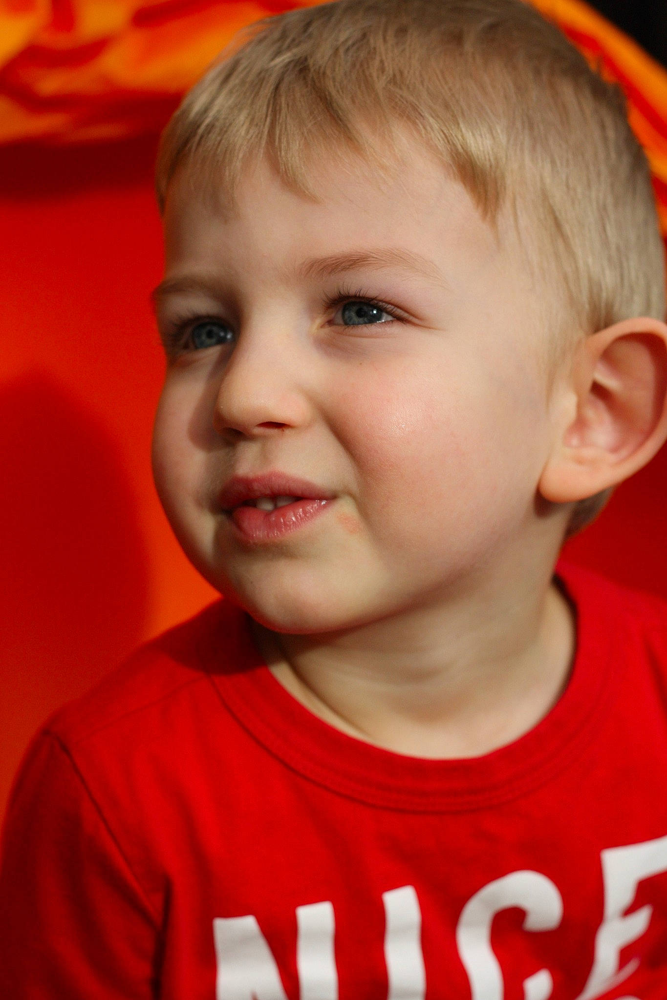 Heath is registered to the contest to win money with this photo: blond, cheek, child, chin, close_up, eye, eyebrow, face, facial_expression, forehead, hair, head, lip, male, mouth, nose, person, red, skin, smile