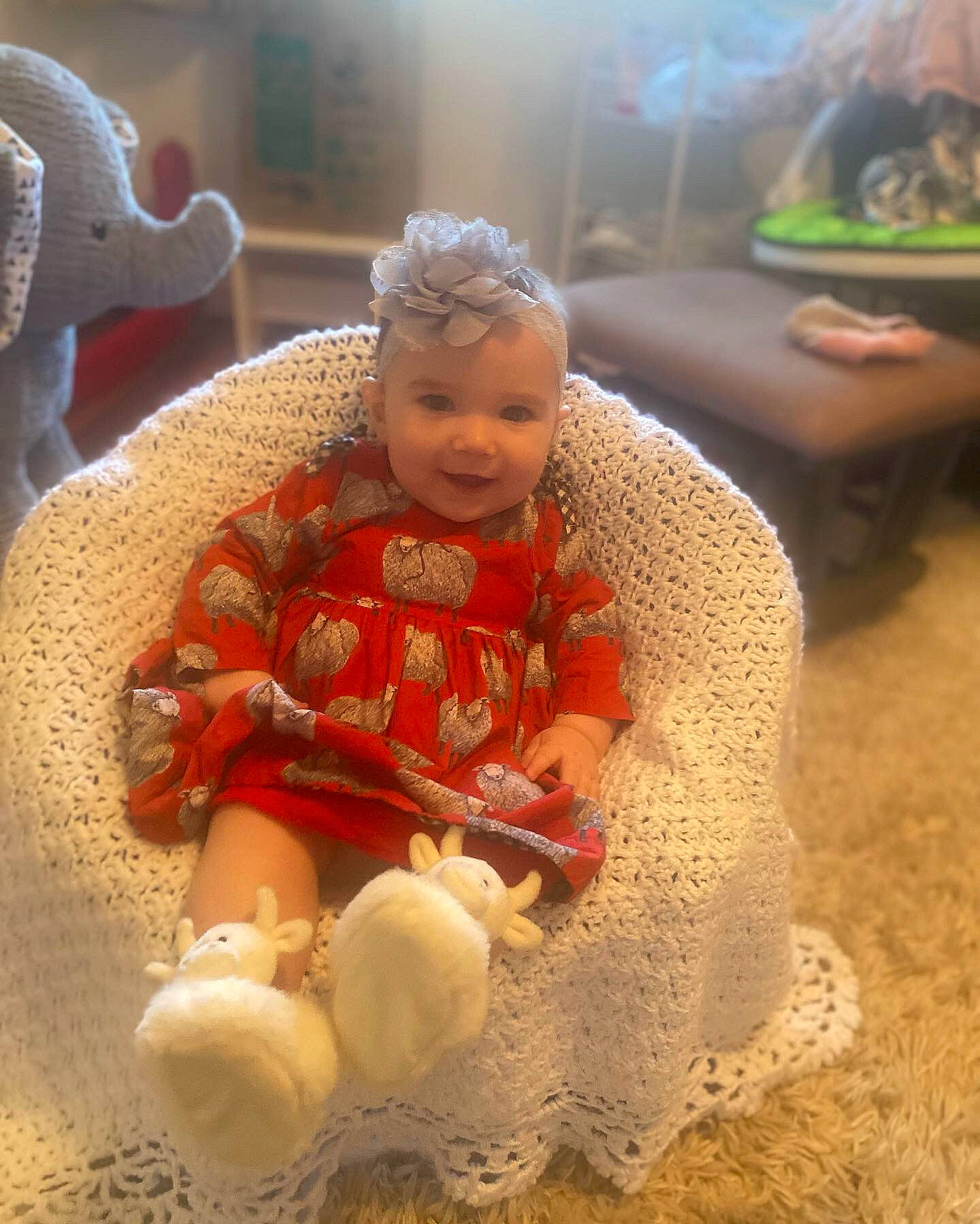 Calliope is registered to the contest to win money with this photo: baby, baby_toddler_clothing, child, event, flooring, fun, happy, joy, person, play, sand, sitting, sleeve, smile, soil, toddler, tradition