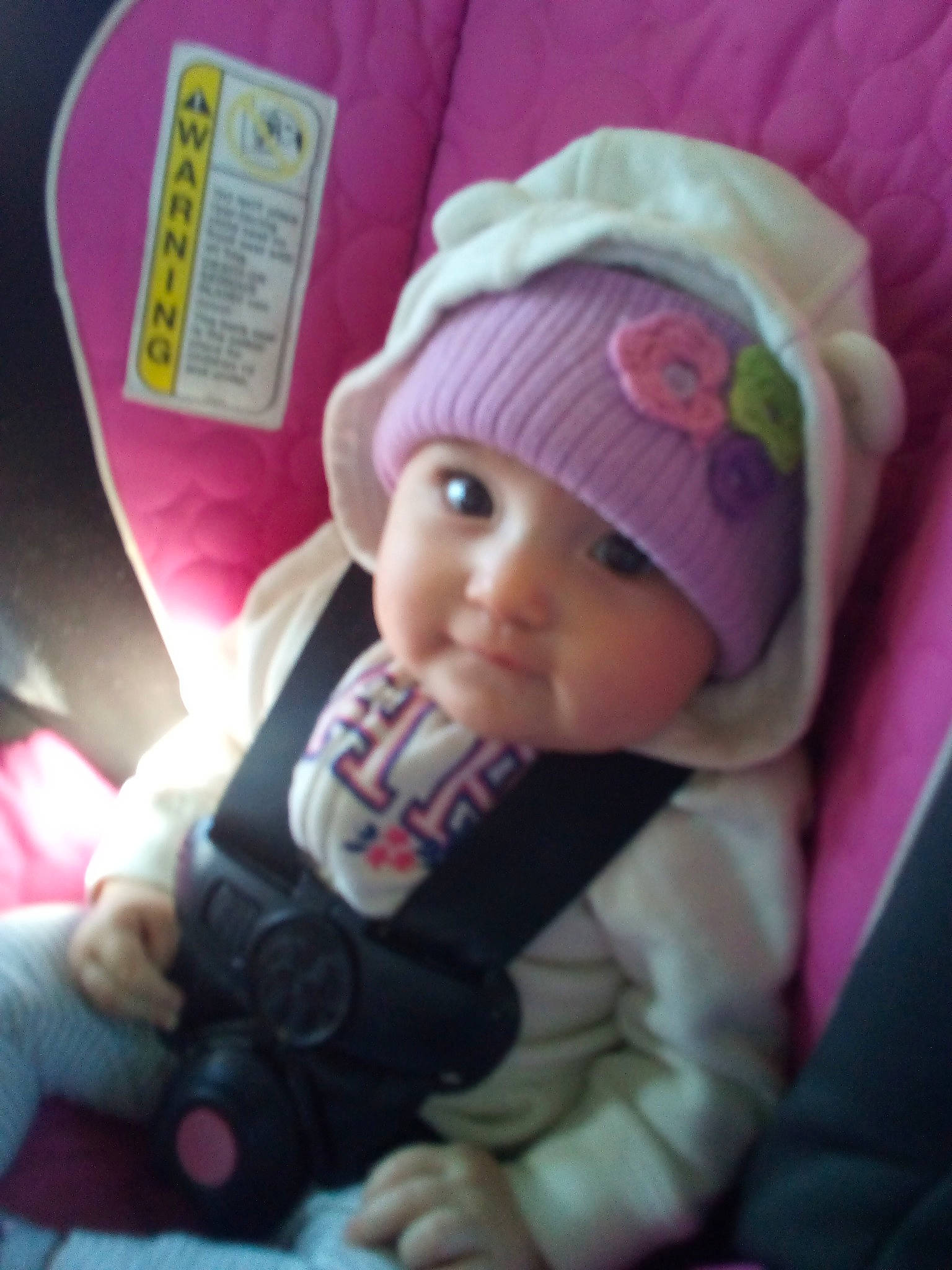 Kinlee joined the competition — help win amazing prizes! baby, beanie, bonnet, cheek, child, headgear, knit_cap, person, pink, skin, toddler, violet
