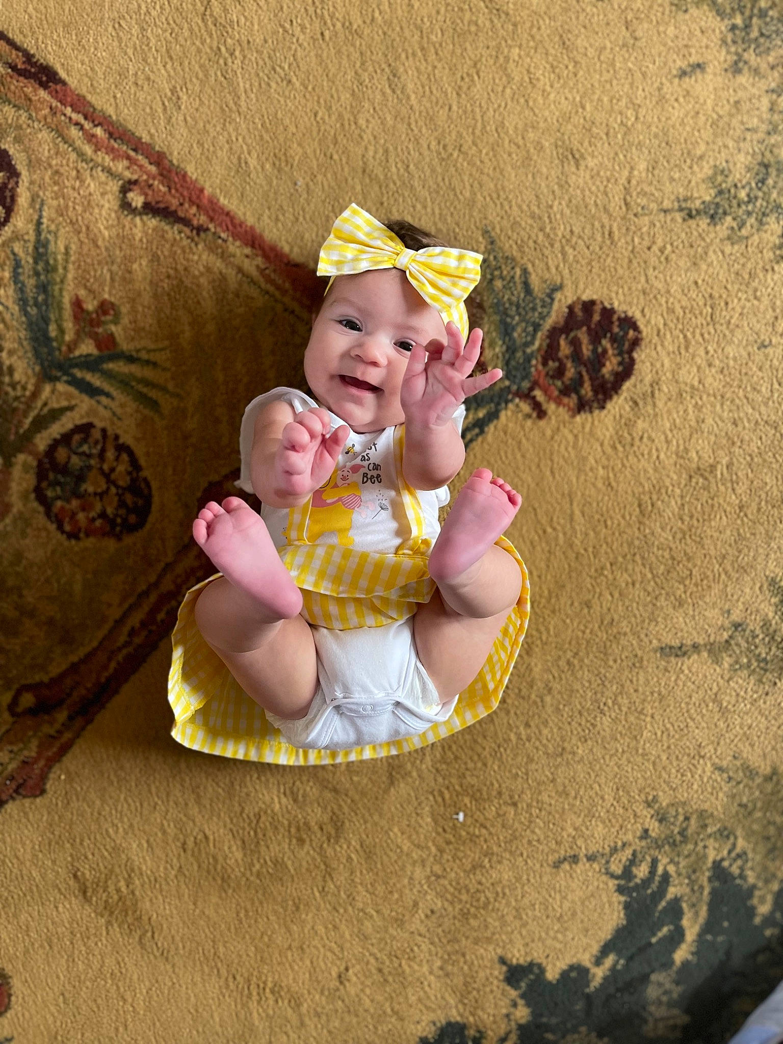 Blakely is registered to the contest to win money with this photo: baby, baby_toddler_clothing, child, circle, eye, finger, foot, fun, grass, happy, hat, head, headwear, landscape, leisure, people_in_nature, person, play, sitting, smile