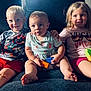 child, children, baby, toddler, couch, toys, toy_blocks, smile, happy, indoor, casual_clothing, bandage, barefoot, sitting, playful, family, blond_hair, shorts, tshirt, portrait