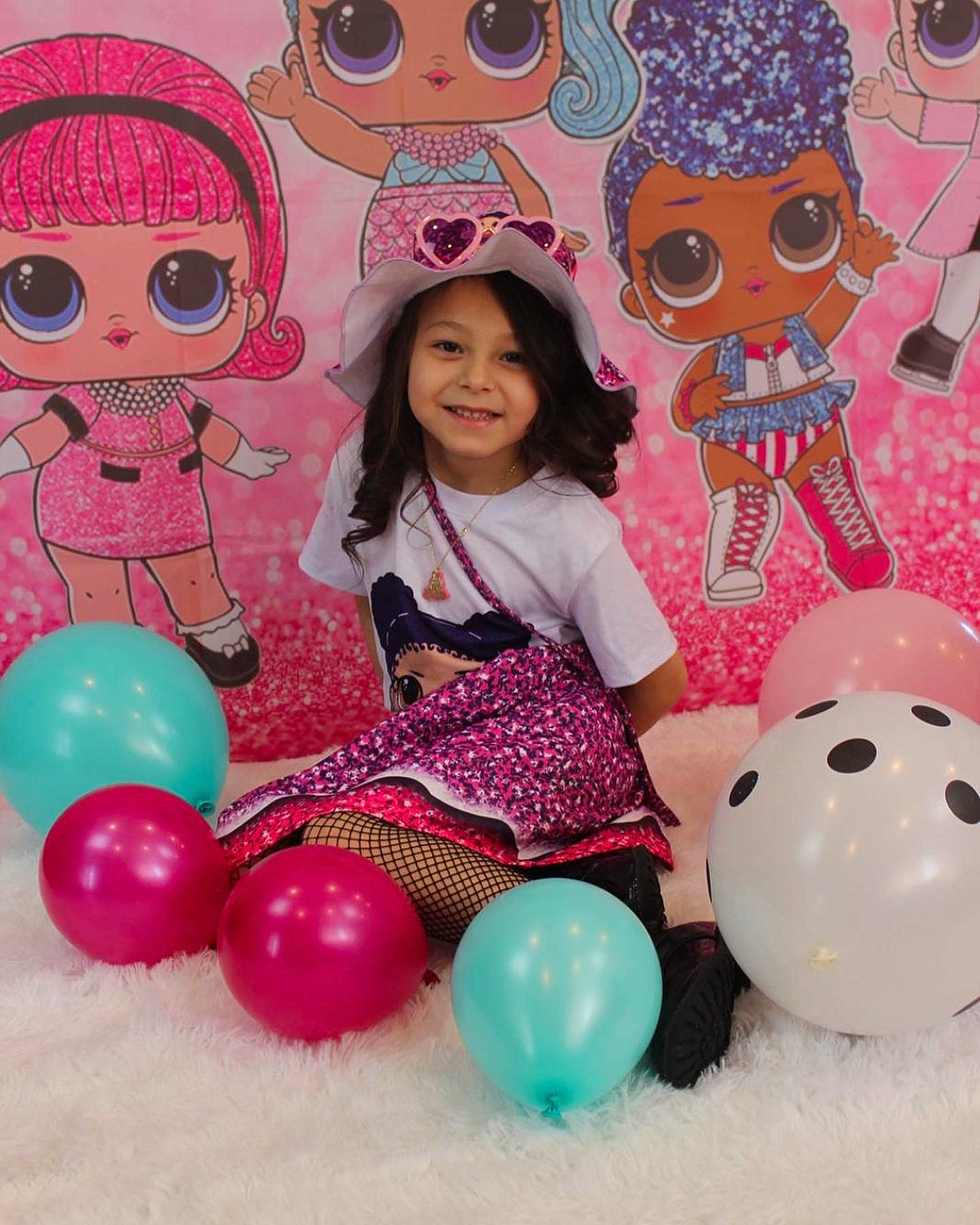 Amiyah joined the competition — help win amazing prizes! balloon, face, facial_expression, fun, happy, head, headwear, human, joy, mammal, organ, party_supply, people, person, photograph, pink, product, red, smile, snowman