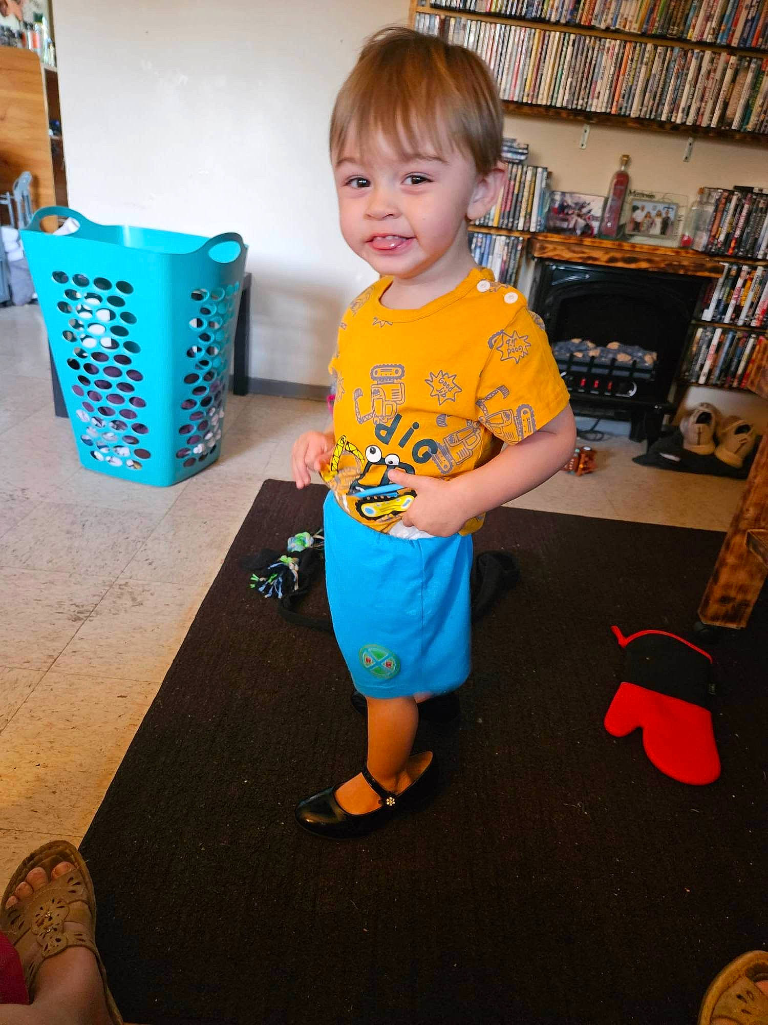 Colson joined the competition — help win amazing prizes! black, blue, child, electric_blue, floor, flooring, fun, green, hairstyle, happy, joy, leg, people, person, shelf, shoe, sleeve, smile, snapshot, standing