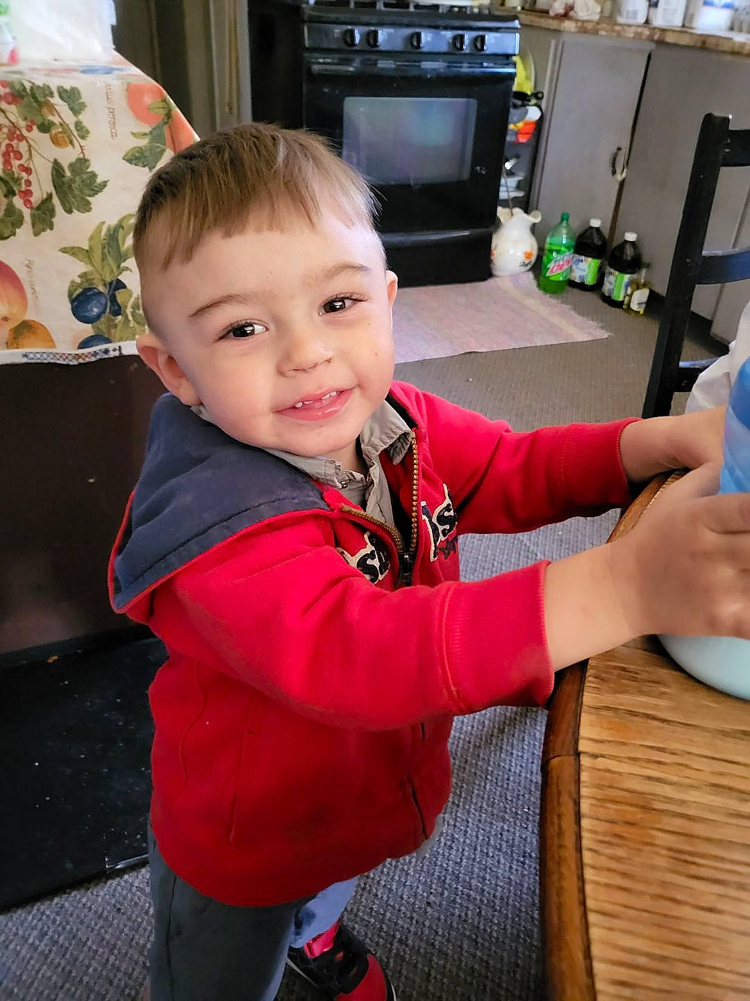 Colson joined the competition — help win amazing prizes! baby_toddler_clothing, child, desk, event, flooring, fun, holiday, home_appliance, joy, kitchen_appliance, person, plastic_bottle, refrigerator, room, sleeve, smile, standing, table, thumb, toddler