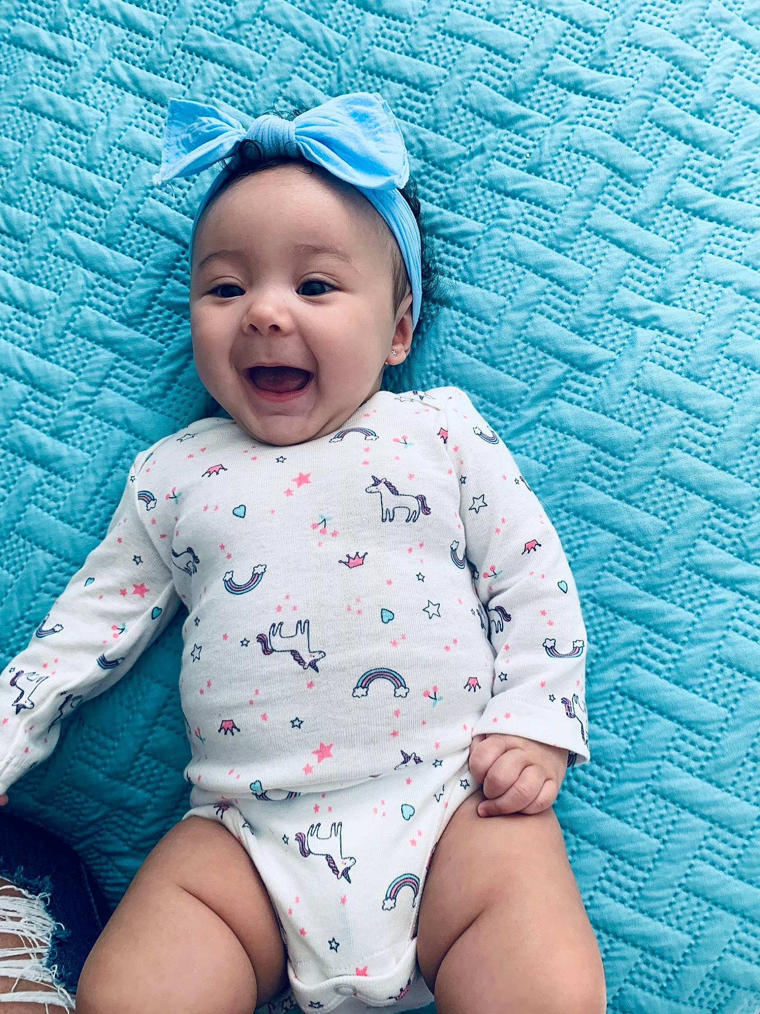 Waylynn joined the competition — help win amazing prizes! baby, baby_laughing, baby_products, baby_toddler_clothing, bonnet, cap, cheek, child, facial_expression, headwear, human, human_body, linens, mouth, nightwear, nose, person, sitting, skin, sleeve