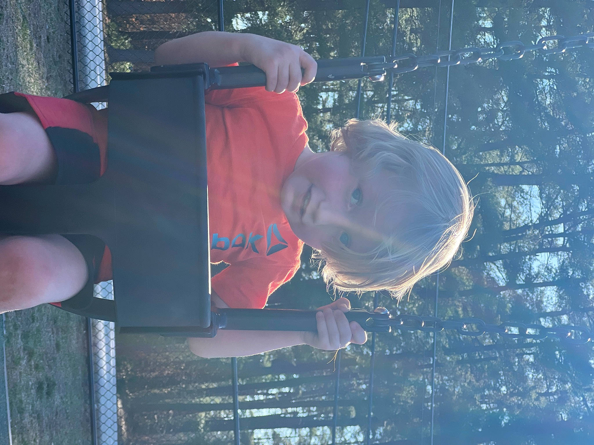 Levi is registered to the contest to win money with this photo: baseball_cap, cap, electric_blue, eyewear, freezing, fun, gesture, happy, hat, leisure, person, portrait_photography, recreation, reflection, sky, smile, sun_hat, tints_and_shades, tree, water