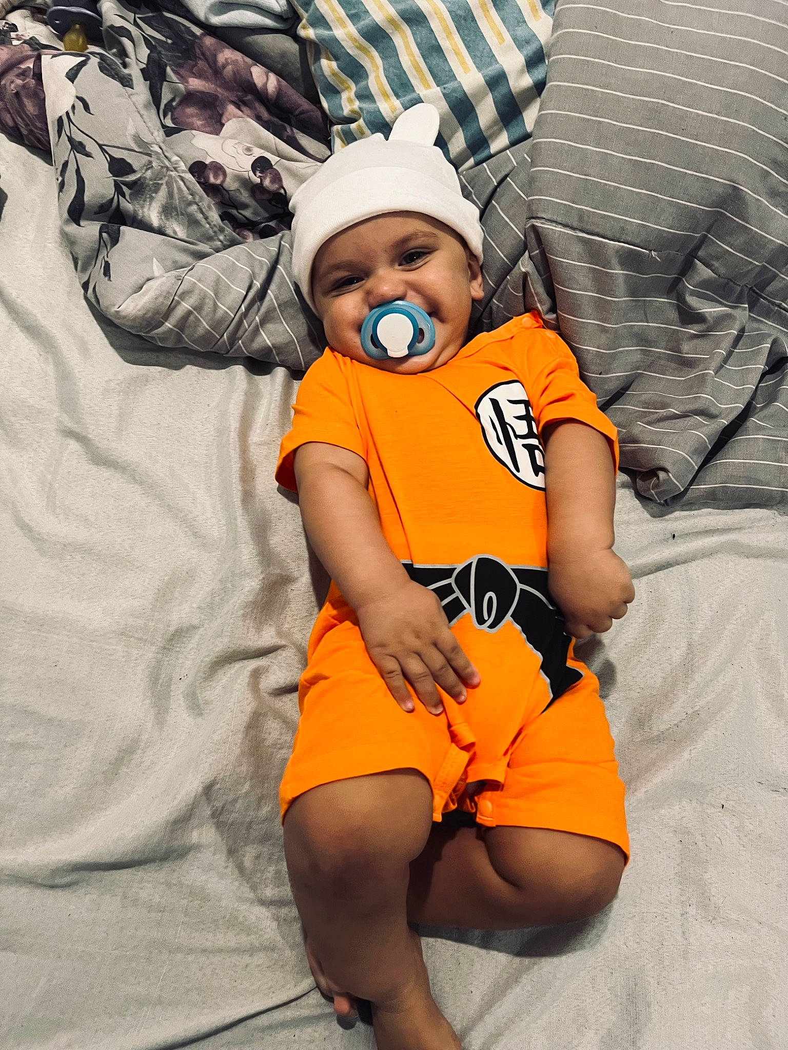 Jakairo joined the competition — help win amazing prizes! baby, baby_toddler_clothing, baseball_cap, cap, child, comfort, foot, fun, glove, happy, hat, headwear, human_leg, knee, orange, person, personal_protective_equipment, shorts, sleeve, t_shirt