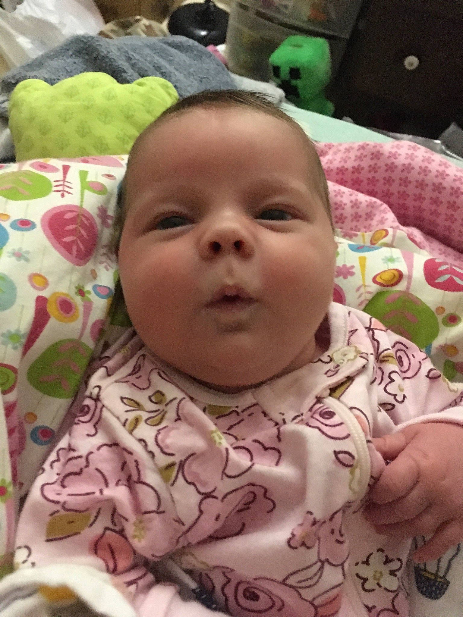 Charlette is registered to the contest to win money with this photo: baby, cheek, chin, ear, eye, eyebrow, facial_expression, forehead, gesture, green, hair, happy, head, human_body, iris, lip, mouth, nose, person, skin