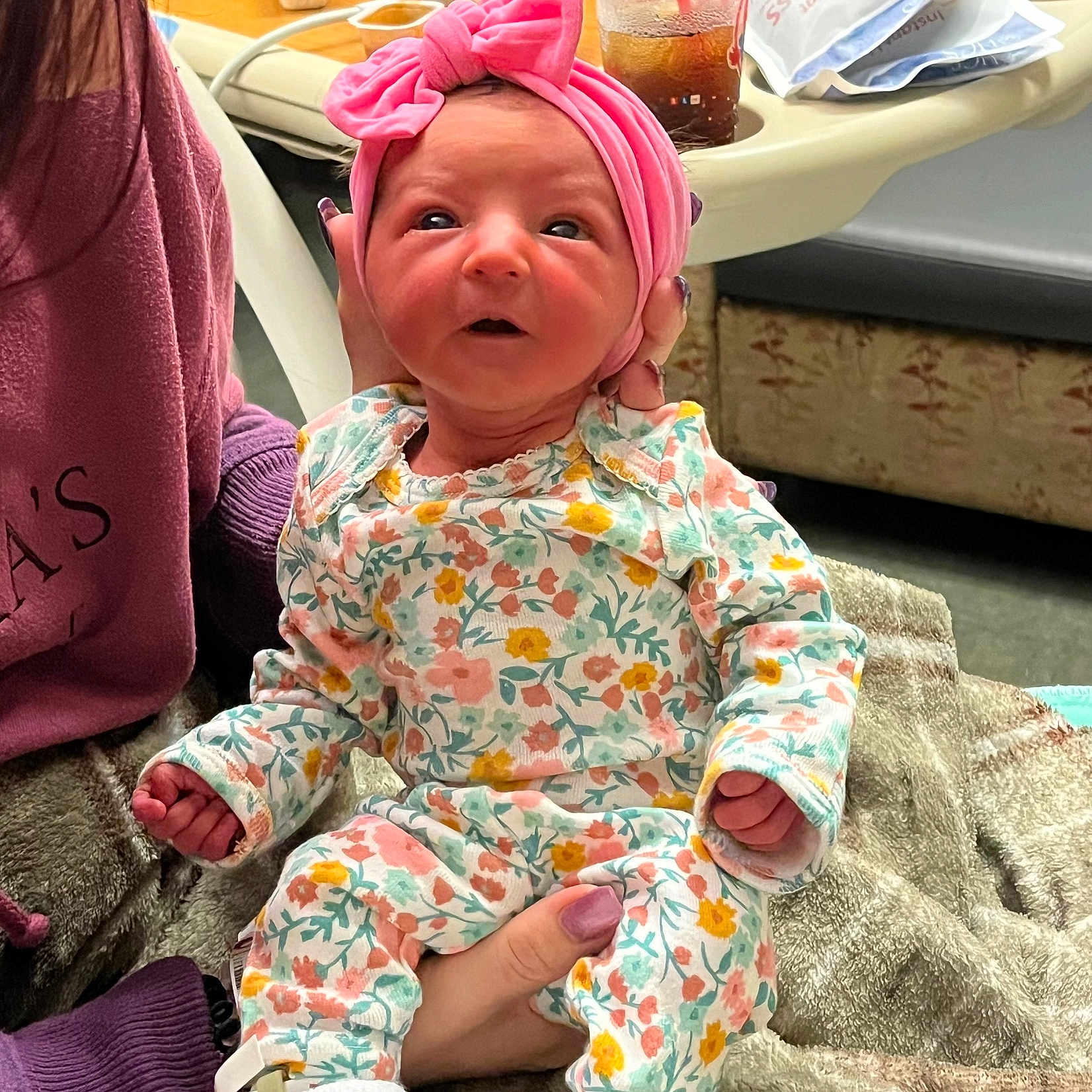 Violet joined the competition — help win amazing prizes! accessories, architecture, baby, building, clothing, couch, face, furniture, glove, happy, hat, head, headband, hospital, newborn, person, photography, portrait, sitting, smile