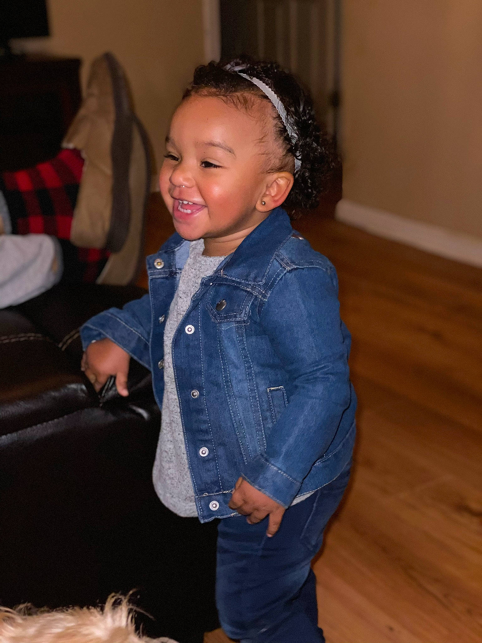 Serenity is registered to the contest to win money with this photo: abdomen, cheek, child, denim, eye, fun, iris, jeans, joy, outerwear, person, sitting, smile, standing, textile, toddler, trunk