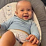 baby, smiling, infant, blue_shirt, baby_seat, happy, cute, child, face, hand, foot, legs, indoor, portrait, young_child, seat_belt, comfort, playful, skin, light