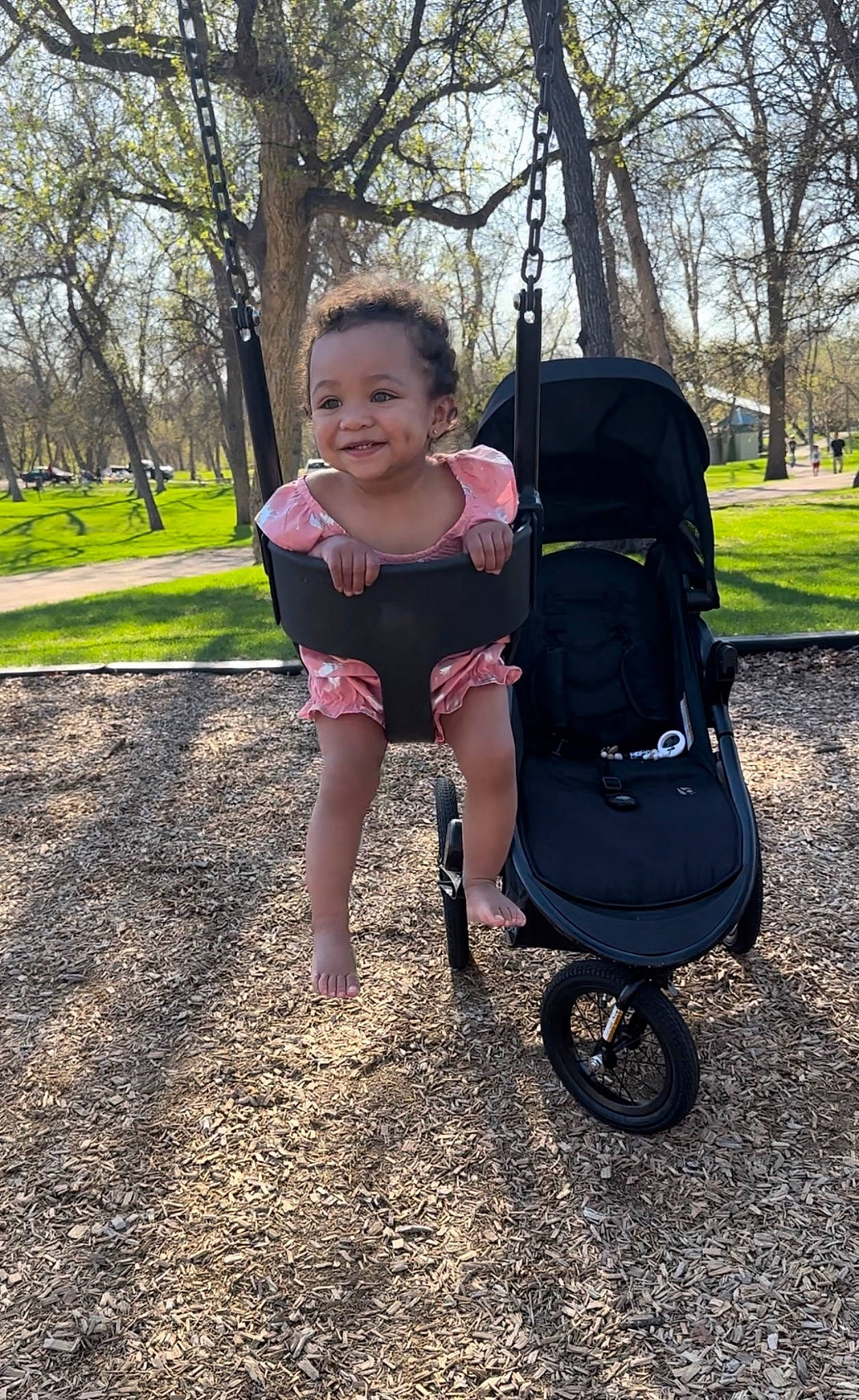 Kamiyah joined the competition — help win amazing prizes! automotive_tire, automotive_wheel_system, baby_carriage, fun, grass, happy, joy, leaf, leisure, magenta, people_in_nature, person, plant, public_space, recreation, rolling, smile, tints_and_shades, tire, toddler