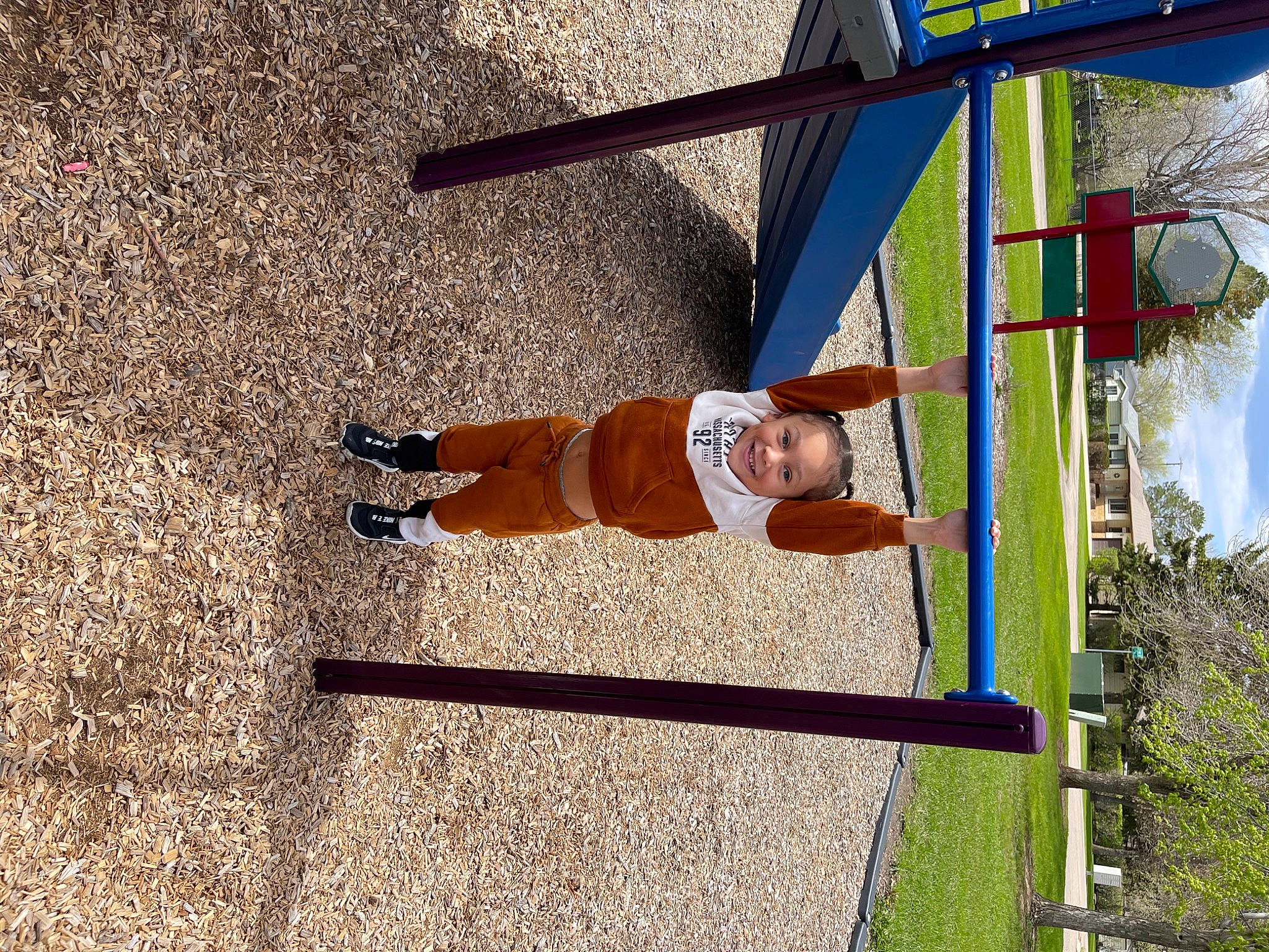 Jeremiah is registered to the contest to win money with this photo: baby, baby_toddler_clothing, child, city, concrete, fun, hat, joy, leisure, outdoor_play_equipment, people_in_nature, person, plant, playground, pole, shadow, sky, soil, toddler, tree