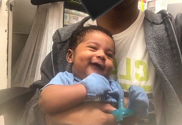 Hassan is registered to the contest to win money with this photo: baby, baby_products, car_seat, child, comfort, event, finger, fun, gesture, happy, health_care, hospital, mouth, nose, person, seat_belt, skin, smile, thumb, toddler