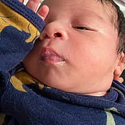 Eithan joined the competition — help win amazing prizes! baby, closeup, face, hand, sleepy, infant, skin, clothing, blue, yellow, mouth, eyelid, fingers, newborn, portrait, cute, soft, indoors, person, expression