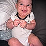 baby, smiling, sitting, infant, cute, happy, onesie, face, hands, feet, pillow, blanket, couch, indoor, child, person, skin, head, expression, closeup