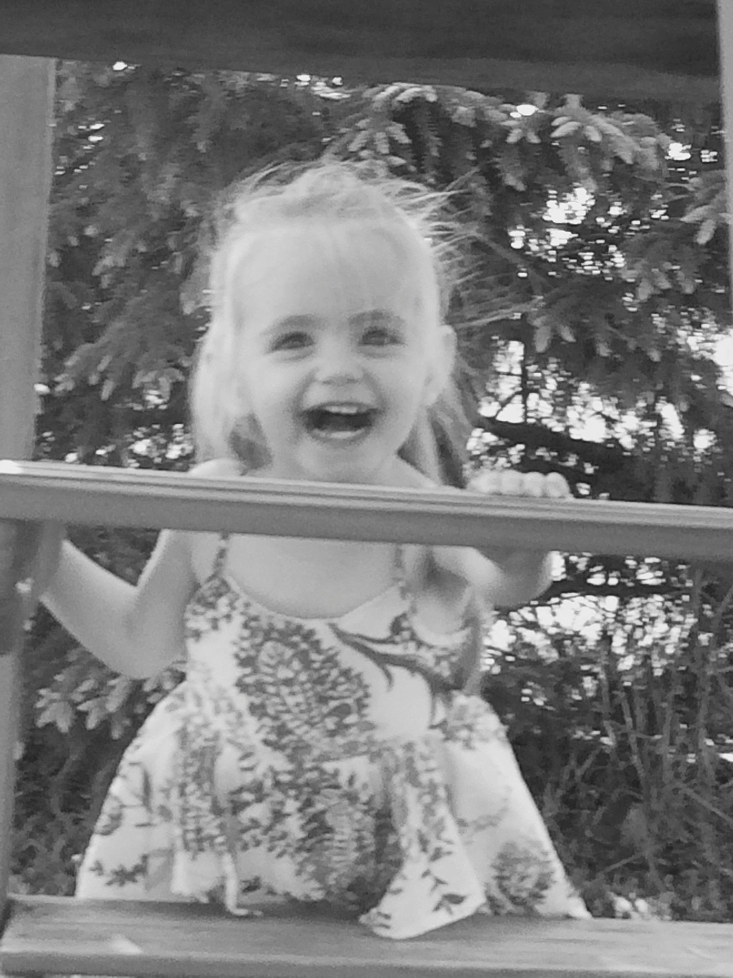 Emberlyn joined the competition — help win amazing prizes! black_and_white, child, emotion, eye, facial_expression, girl, hair, head, human_hair_color, joy, monochrome, monochrome_photography, organ, person, photograph, photography, portrait, smile, snapshot, standing