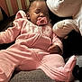 baby, sleeping, pacifier, pink_onesie, plush_toy, soft_toys, indoor, child, cute, relaxed, cozy, infant, resting, furniture, home, portrait, young_child, peaceful, cuddling, sleep
