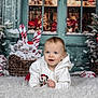 baby, candy_canes, child, christmas_tree, cute, decorations, festive, fluffy_rug, happy, holiday, hoodie, indoor, mickey_mouse, pine_cones, portrait, seasonal, smiling, snow, winter, wrapped_presents