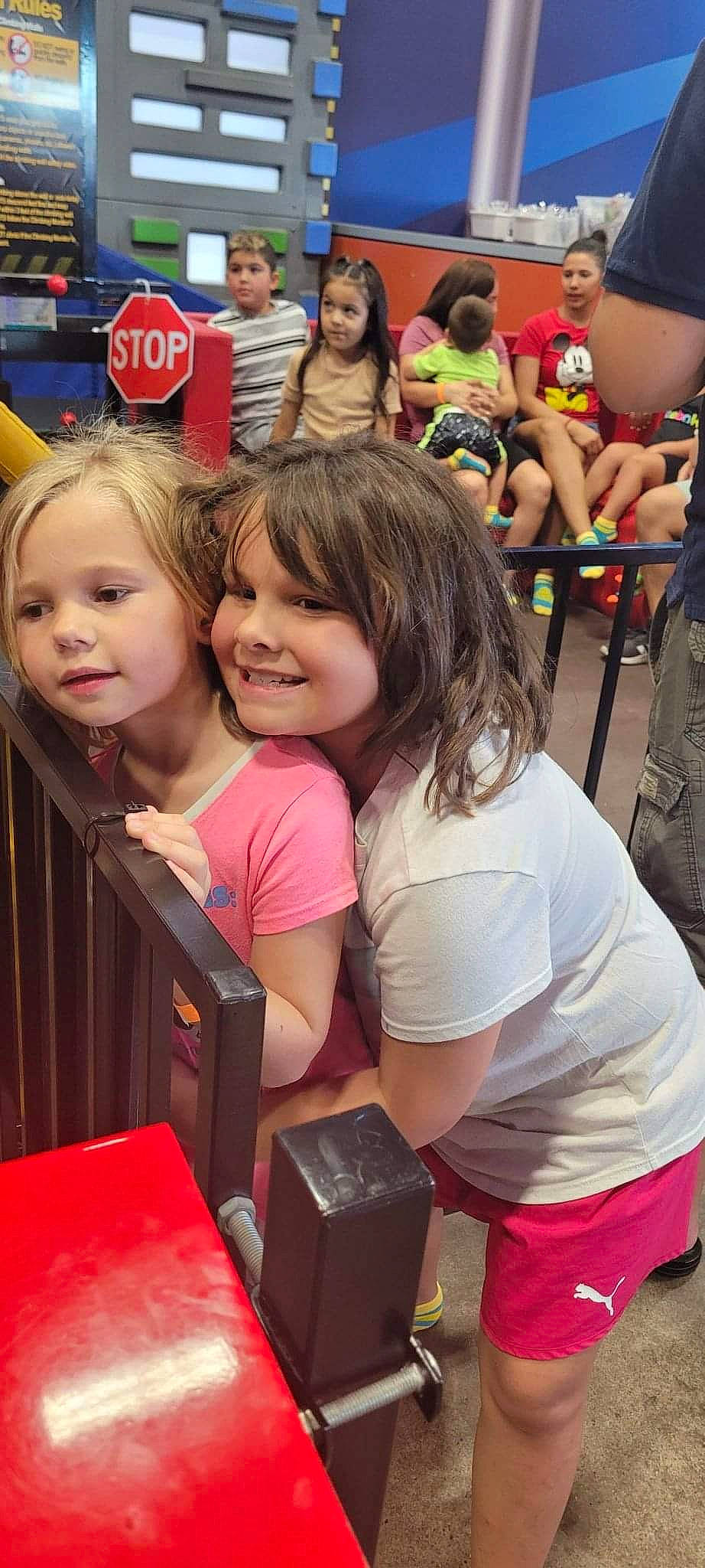 Kelsey joined the competition — help win amazing prizes! blond, box, child, crowd, event, fun, happy, joy, leisure, magenta, people, person, pink, public_space, recreation, red, shipping_box, shorts, snapshot, social_group