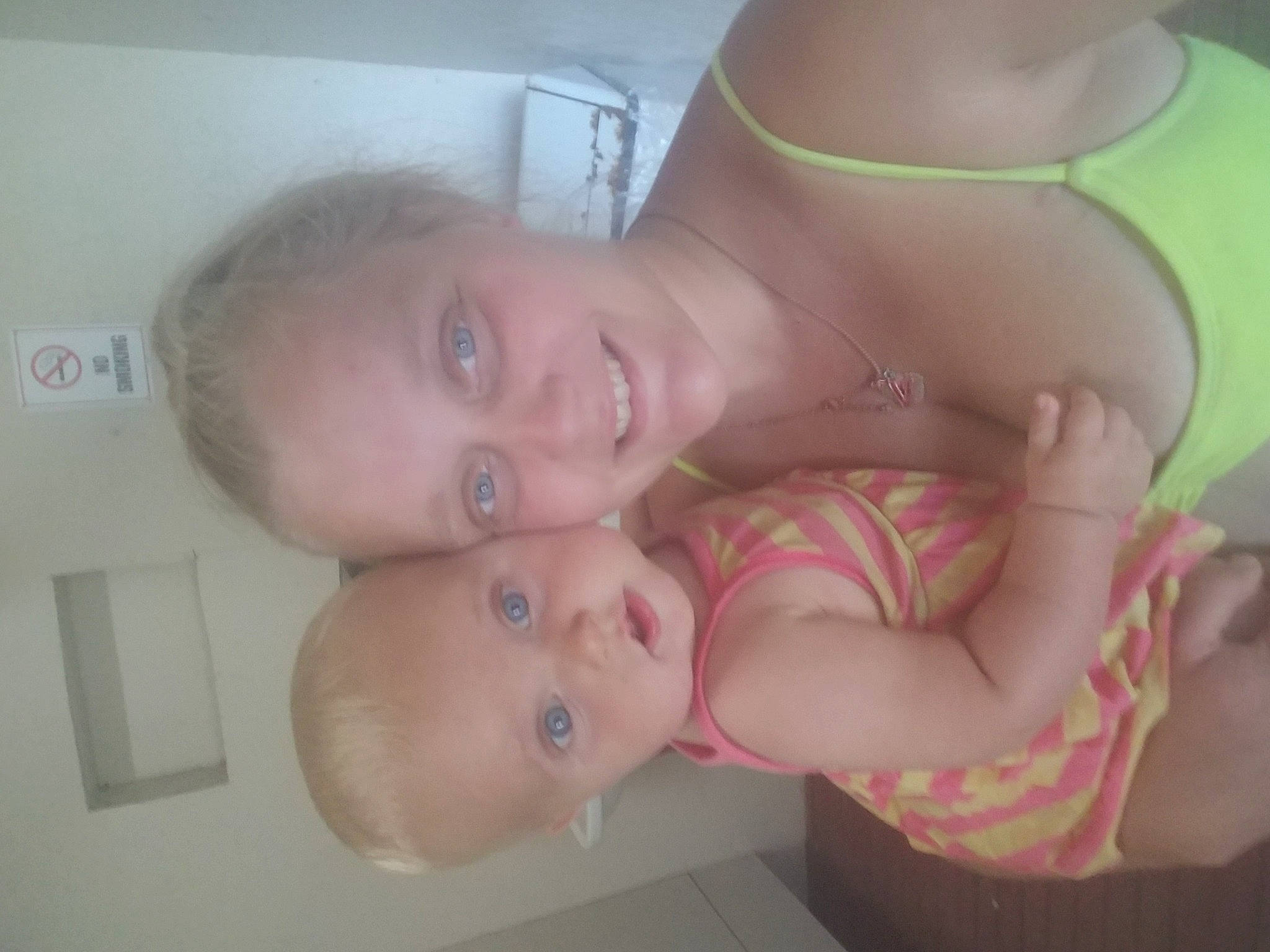 Carly is registered to the contest to win money with this photo: arm, cheek, chest, dress, ear, eyelash, finger, gesture, hand, happy, human_body, jaw, joy, lip, mouth, neck, nose, person, shoulder, skin