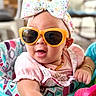 Brynlii joined the competition — help win amazing prizes! baby, sunglasses, headband, bow, infant, walker, colorful, toy, pink, yellow, patterned, clothing, arm, hand, smile, cute, indoor, child, portrait, accessory