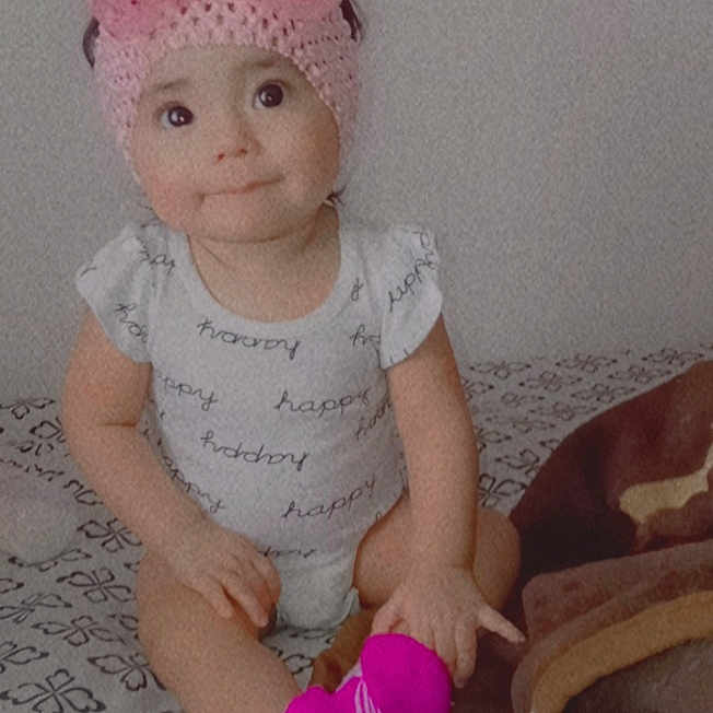 Neveah joined the competition — help win amazing prizes! baby, baby_toddler_clothing, cap, child, dress, fashion_accessory, fun, hair_accessory, happy, hat, headgear, headpiece, magenta, pattern, pink, skin, sleeve, smile, textile, toddler