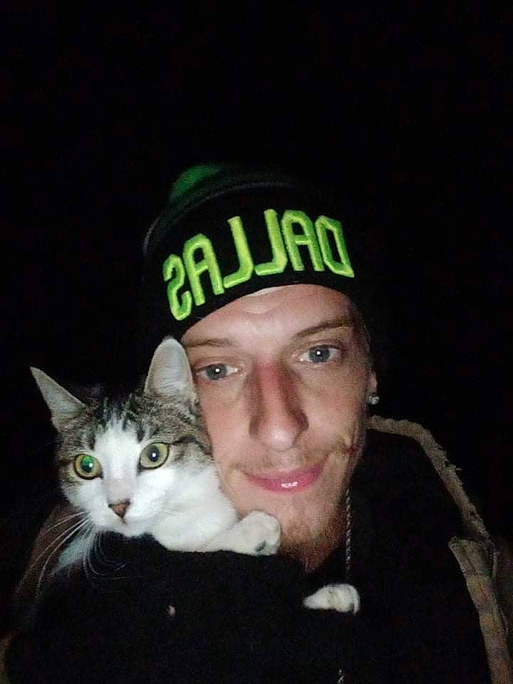 Sweetpea is registered to the contest to win money with this photo: beard, cap, carnivore, cat, costume_hat, domestic_short_haired_cat, event, eye, facial_hair, fashion_accessory, felidae, fur, gesture, happy, hat, moustache, pleased, small_to_medium_sized_cats, smile, whiskers