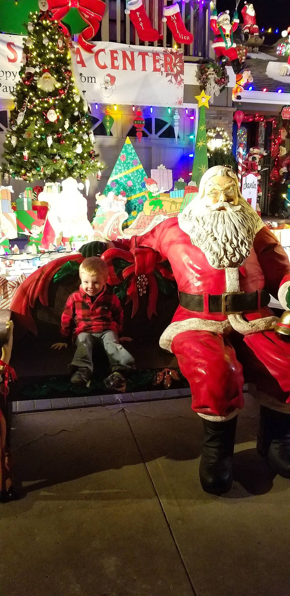 Zane is registered to the contest to win money with this photo: christmas, christmas_decoration, event, festival, fete, fictional_character, fun, holiday, joy, person, santa_claus, tradition