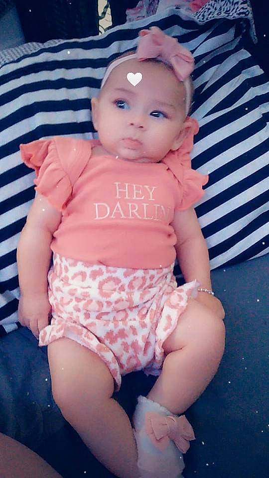 Icelyn is registered to the contest to win money with this photo: abdomen, baby, baby_toddler_clothing, blue, cheek, chest, chin, doll, eye, head, headwear, knee, person, pink, shorts, skin, sleeve, stomach, thigh, toy