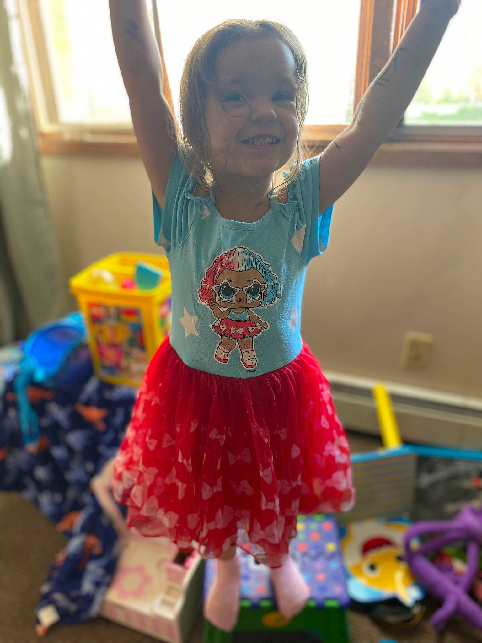 Kaylani is registered to the contest to win money with this photo: baby_toddler_clothing, child, costume, entertainment, event, fun, happy, human_body, human_leg, joy, kindergarten, leisure, magenta, pattern, person, play, room, sleeve, smile, t_shirt