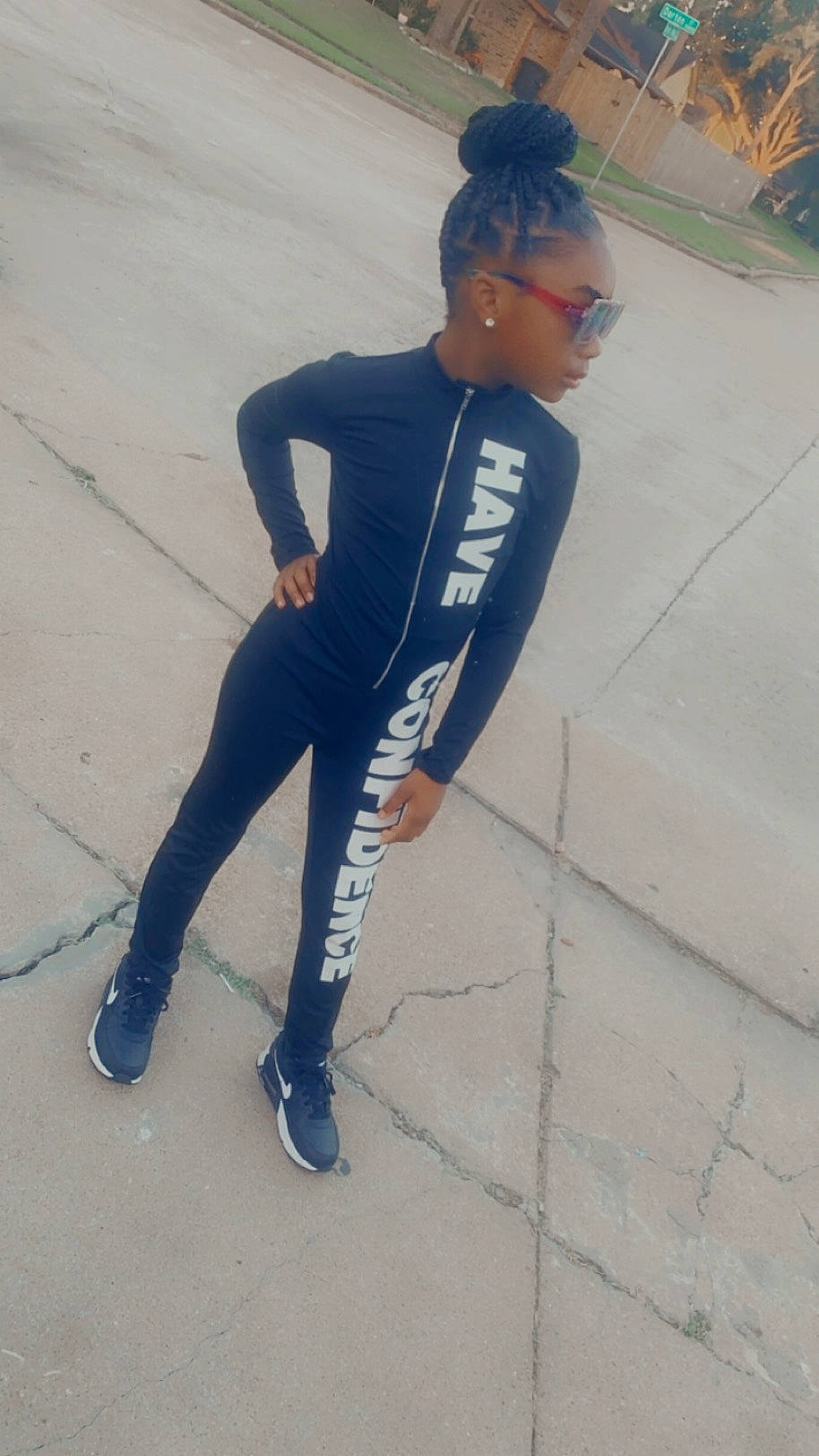 Nia is registered to the contest to win money with this photo: asphalt, denim, dress, electric_blue, eyewear, goggles, headgear, human_body, human_leg, knee, person, personal_protective_equipment, recreation, sleeve, spandex, sports_gear, sportswear, sunglasses, t_shirt, thigh