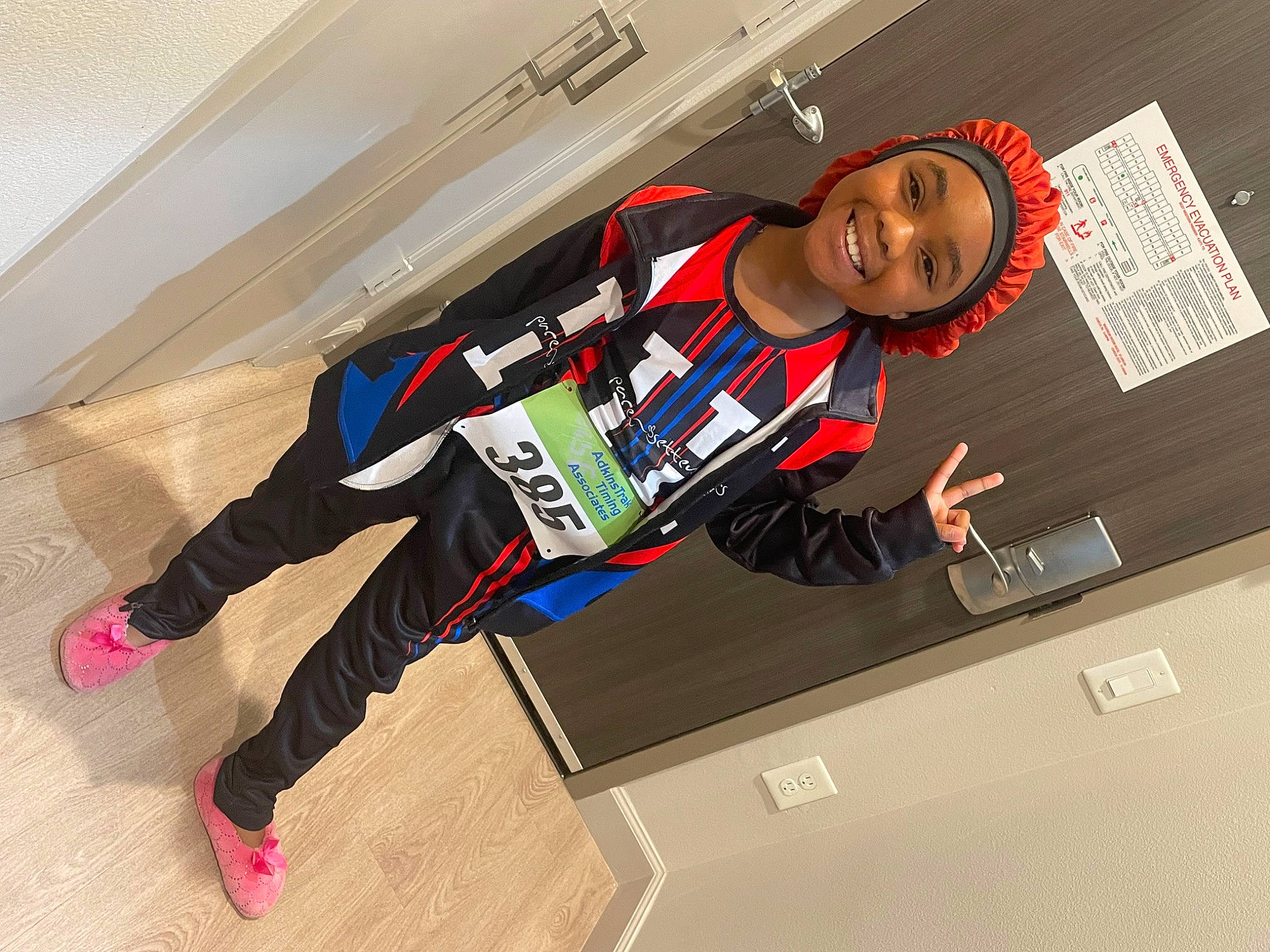 Nia is registered to the contest to win money with this photo: aerospace_engineering, automotive_design, automotive_exterior, eyewear, flooring, font, footwear, fun, graphics, headwear, human_leg, joy, luxury_vehicle, machine, motor_vehicle, person, personal_protective_equipment, recreation, smile, sportswear