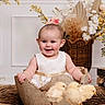 baby, child, dress, chicks, bird, animal, egg, prop, smile, happy, indoor, flower, decoration, basket, cute, portrait, infant, nature, soft, warm_tones